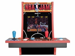 Red arcade machine with joysticks and buttons