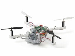 White drone with see-through body showing wiring