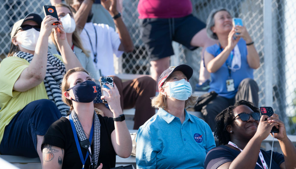 people watching a Wallops Island rocket launch