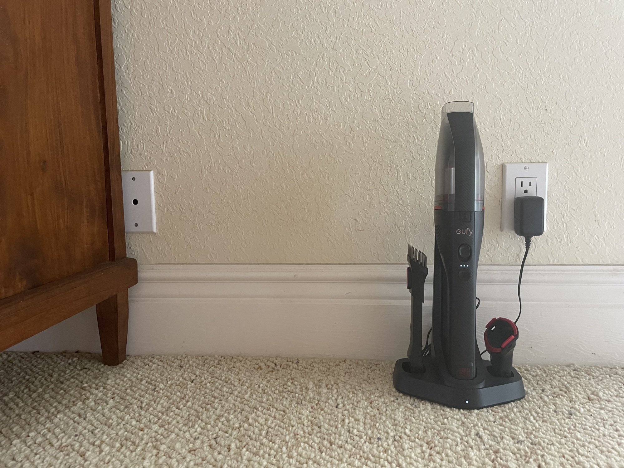 Image of Eufy HomeVac H30 Venture on the floor plugged in