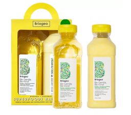 yellow shampoo & conditioner bottles beside carrying case