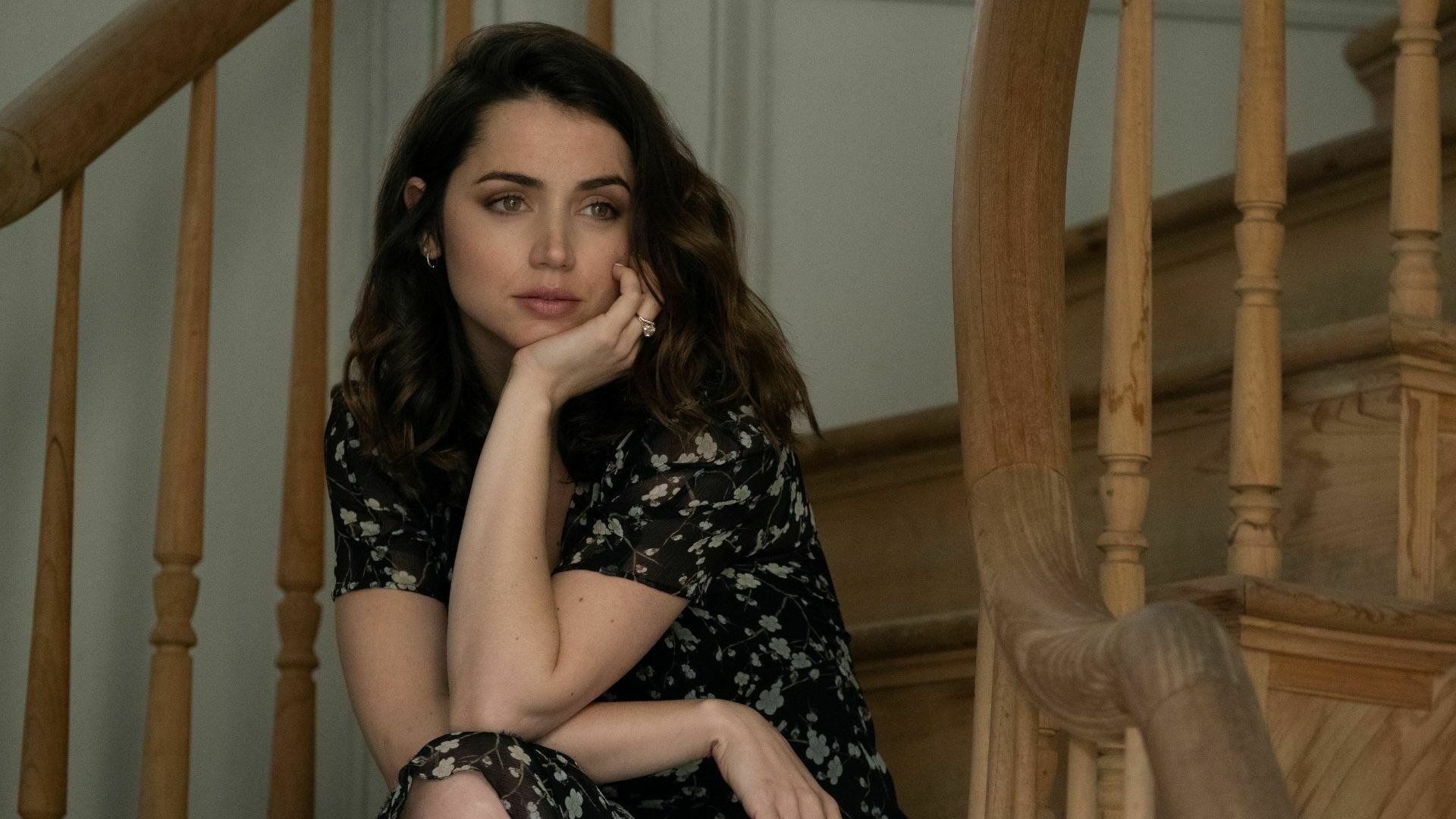 Ana De Armas sits on the stairs in "Deep Water."