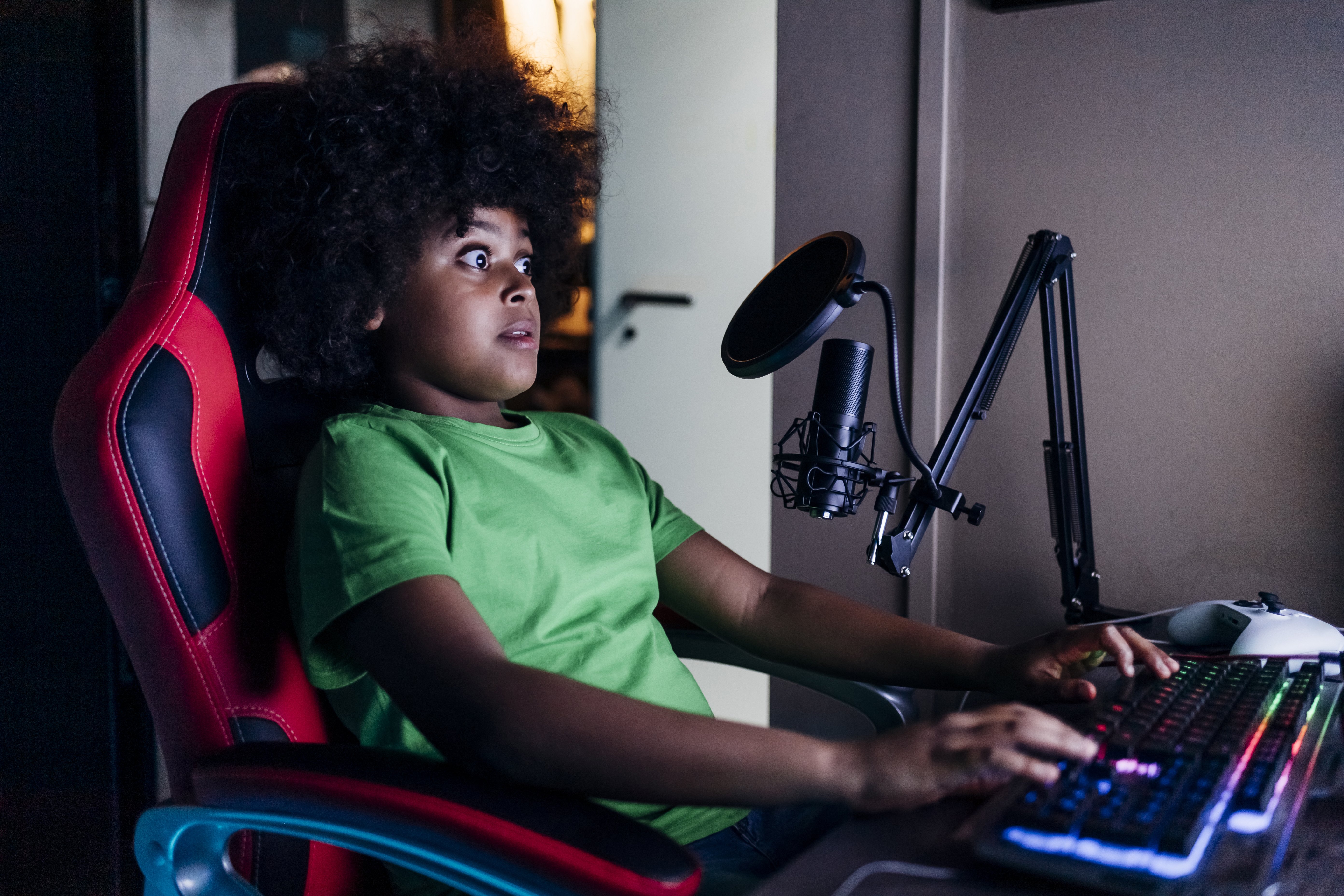 A shock young boy watches video game streaming platform Twitch