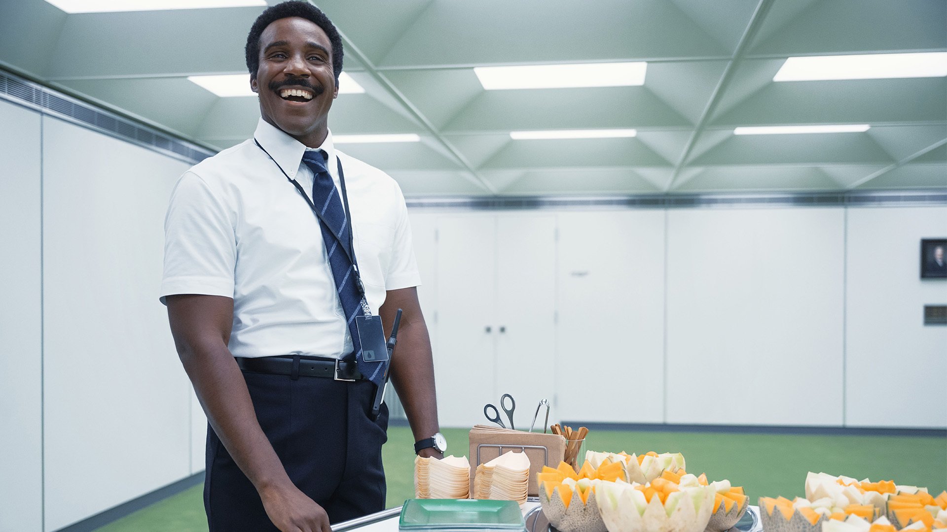 A man (Tramell Tillman as Mr. Milchick in 