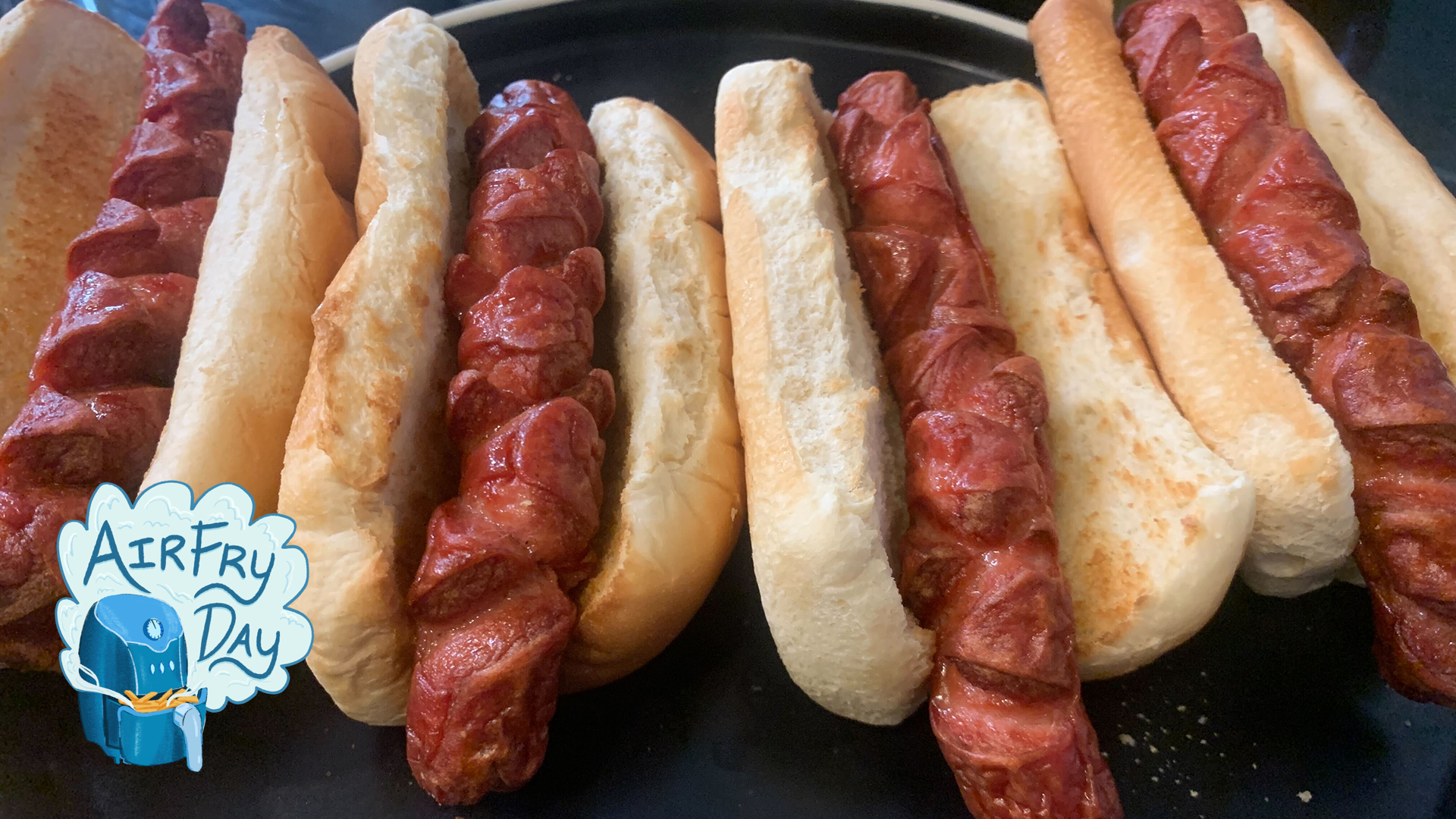 cooked hot dogs in bun with airfryday logo