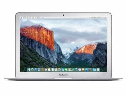 Silver macbook air with mountain background