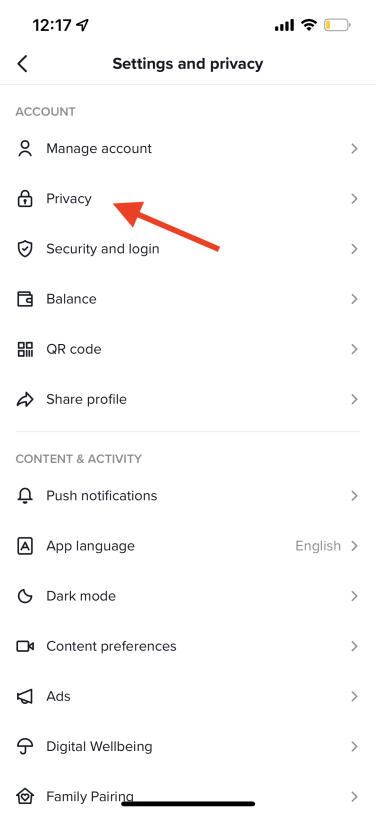 TikTok settings, with red arrow pointing to "Privacy."