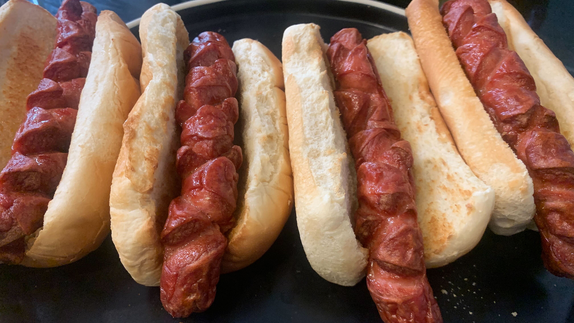 cooked hot dogs in buns
