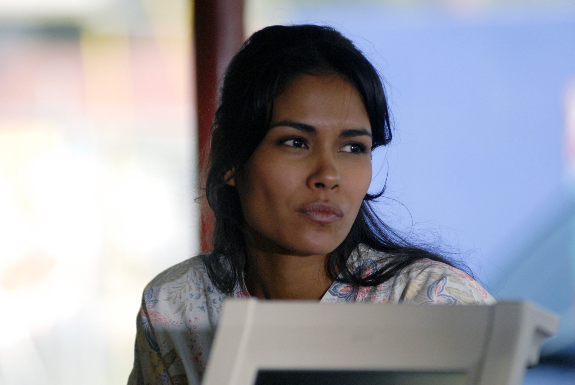 A teenage girl (Daniella Alonso as Carlotta on "FNL") sitting in a chair.