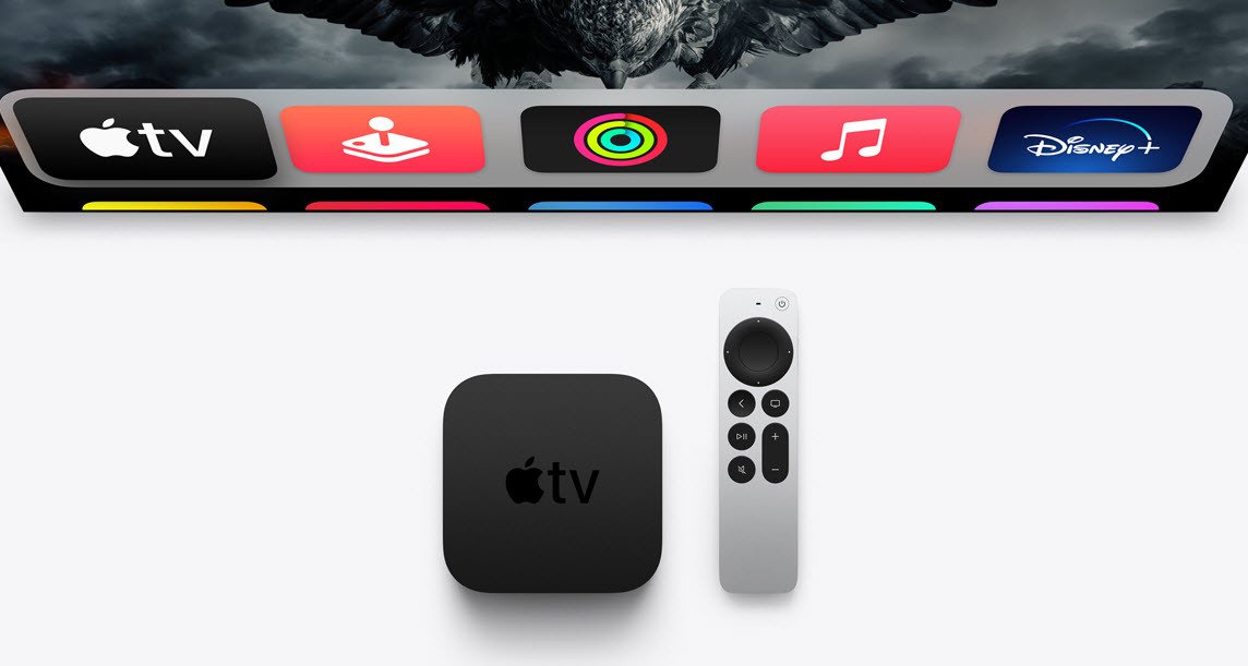 Apple TV 4K 32GB streaming device with Siri Remote sitting in front of TV