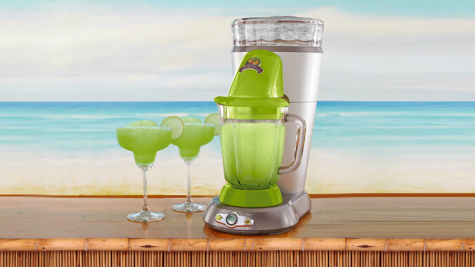 the margaritaville bahamas frozen concoction maker on a wooden bar in front of a beachy background
