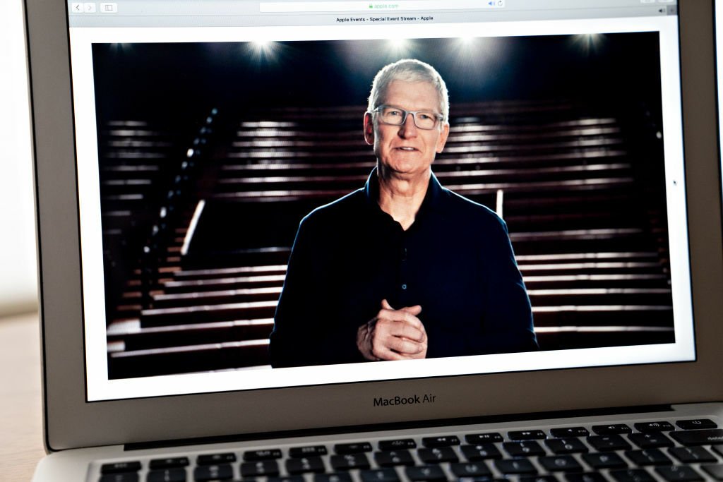 Apple CEO Tim Cook on laptop screen for WWDC