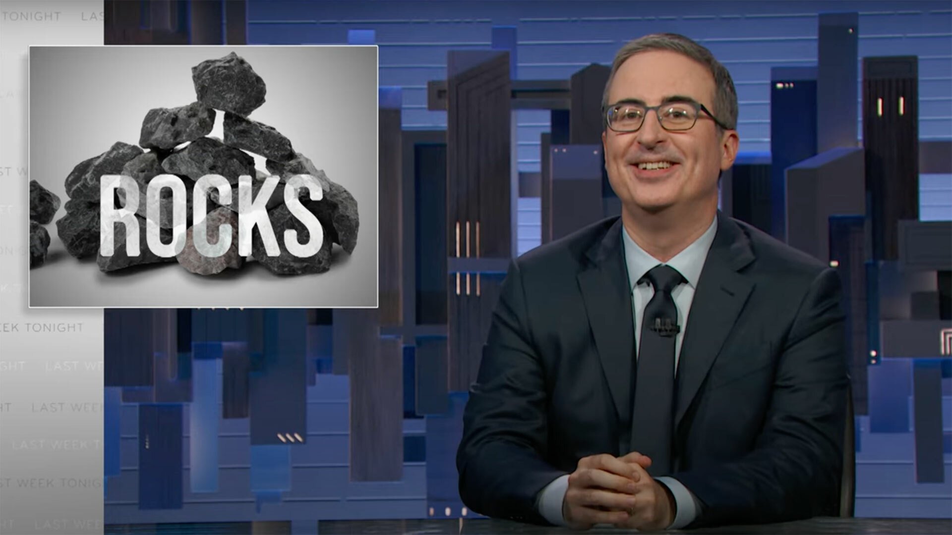 John Oliver on rocks