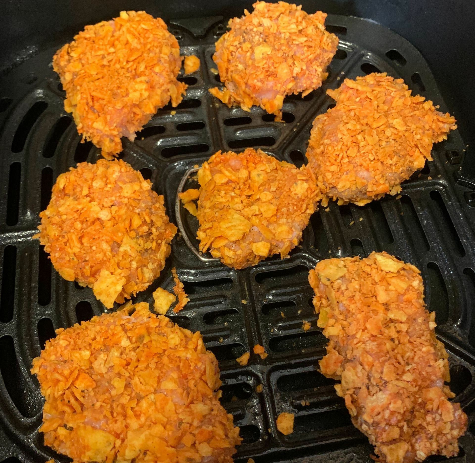 chicken nuggets uncooked in air fryer basket