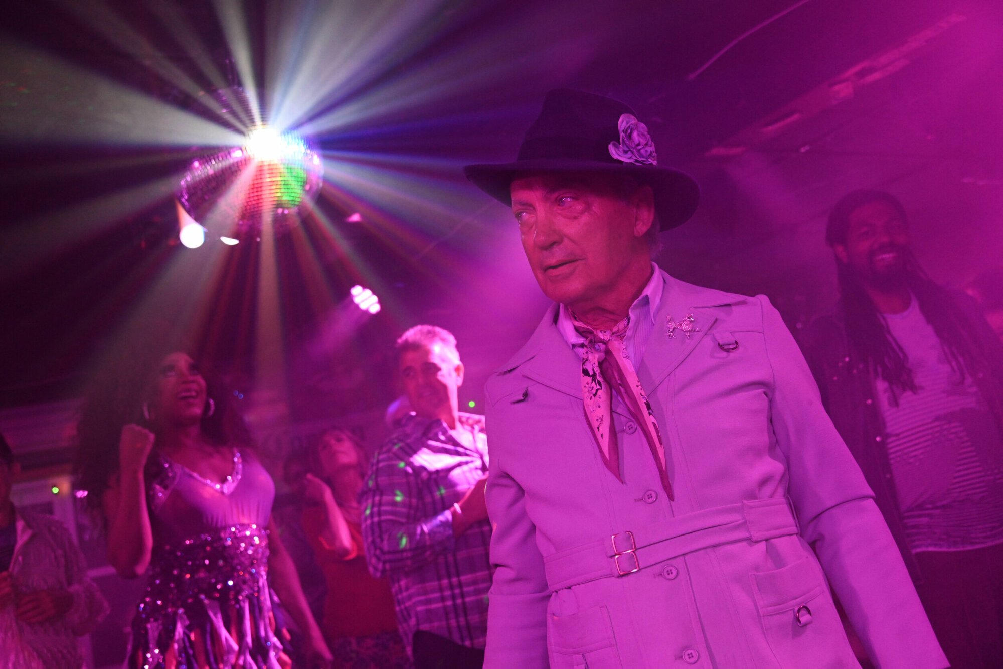 Udo Kier in a disco in "Swan Song."