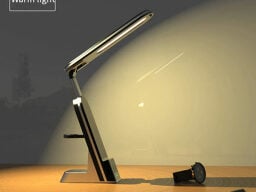 Long lamp giving golden light on desk