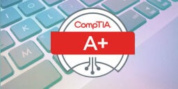 CompTIA A+ logo over image of keyboard