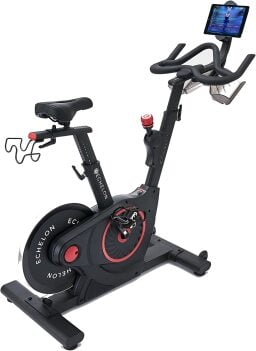 Echelon EX5 smart exercise bike with tablet displaying workout class.