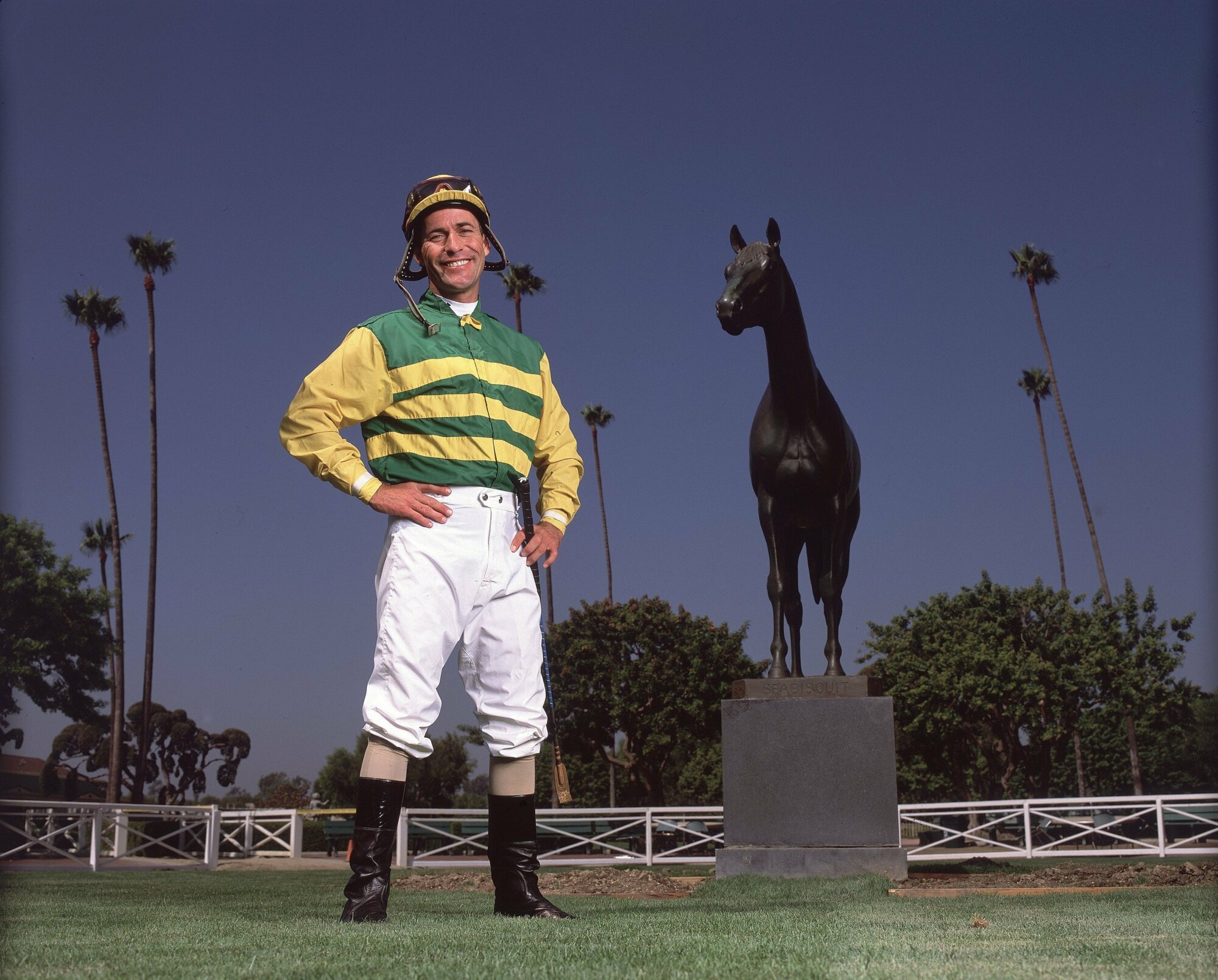 Jockey Gary Stevens in front of Seabiscuit statue at Santa Anita Track