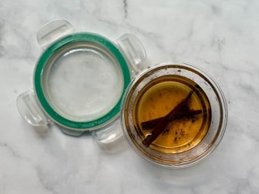 top view of jar with vanilla extract in it