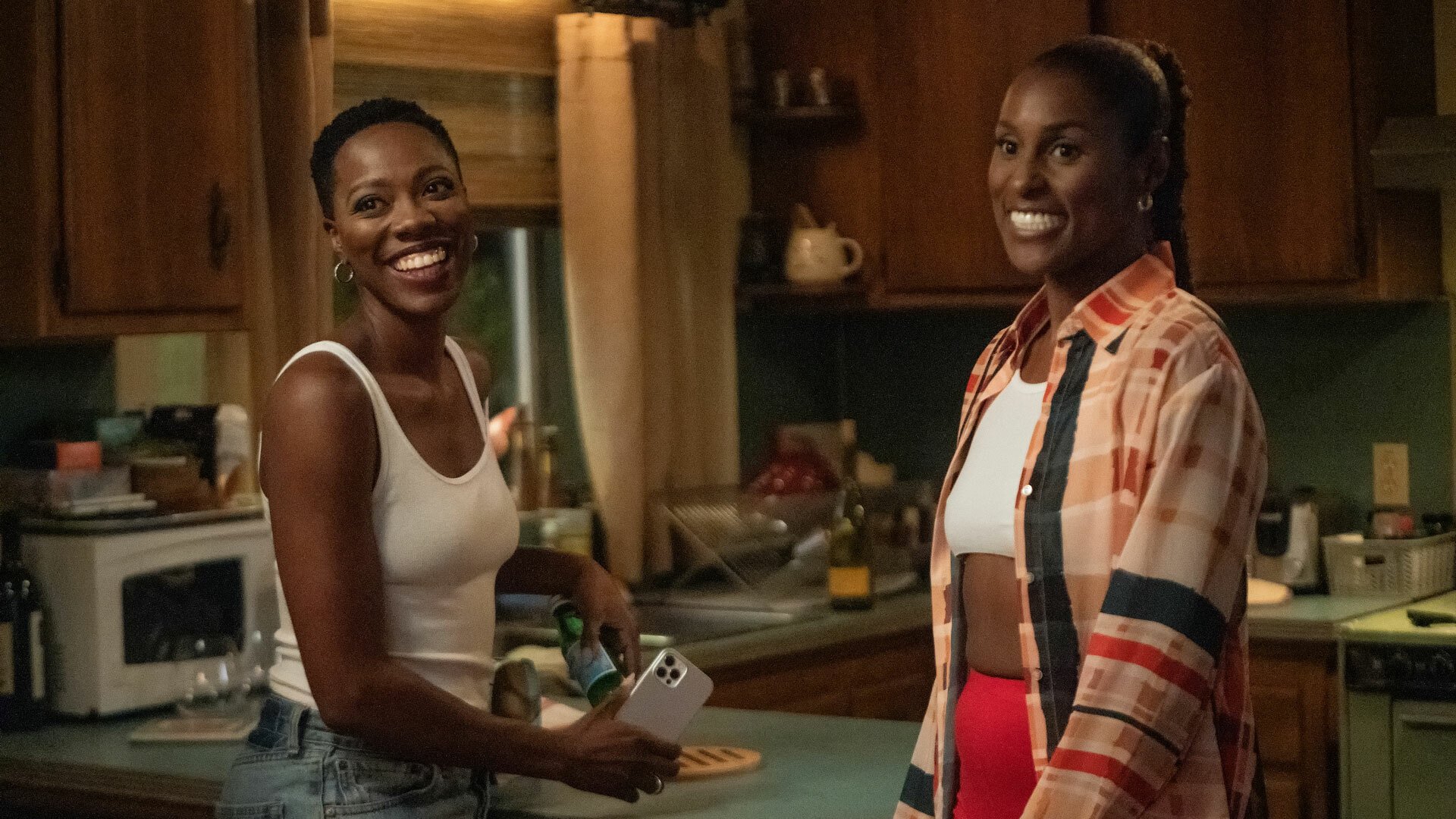 A still from HBO's "Insecure" featuring stars Yvonne Orji and Issa Rae.