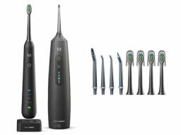 Black toothbrush and water flosser with different replacement heads for both