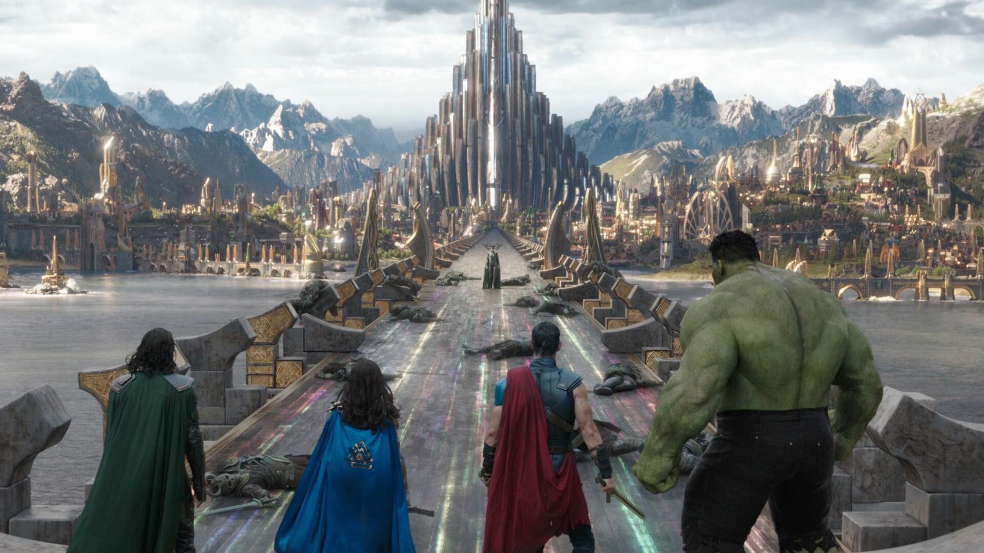 A still from "Thor: Ragnarok." Loki, Valkyrie, Thor, and Hulk, seen from behind, face off against Hera on the Bifrost.
