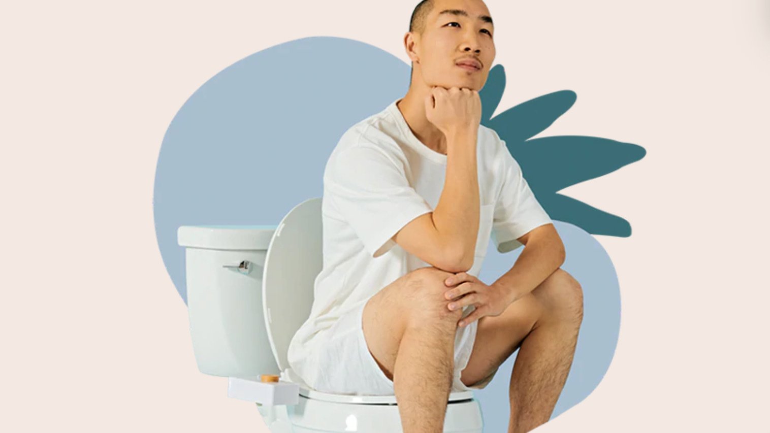 Person sitting on white toilet with chin on hand looking pensively into the distance