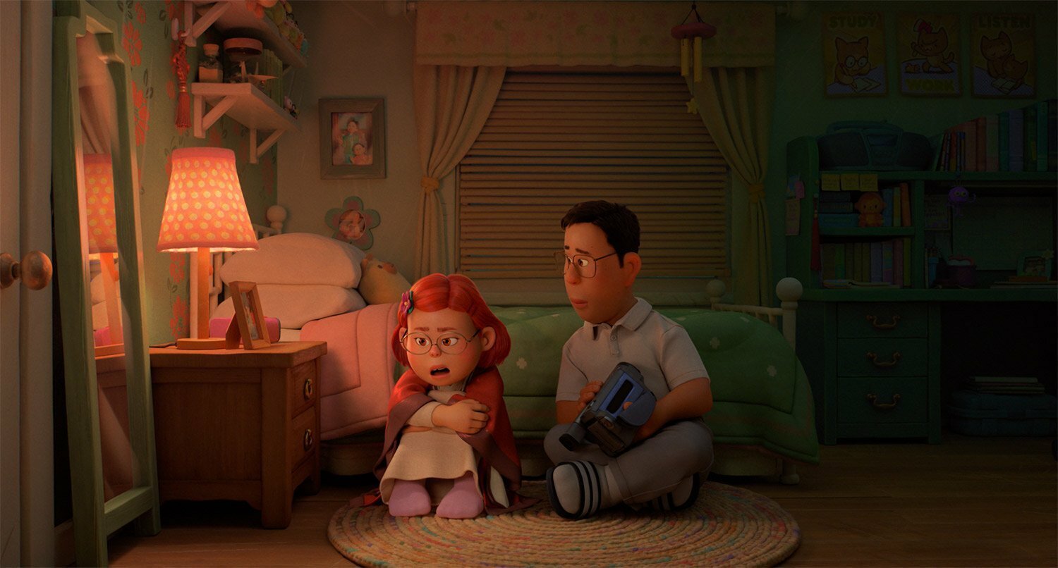 Animated still of Mei and her father sitting on the floor talking.
