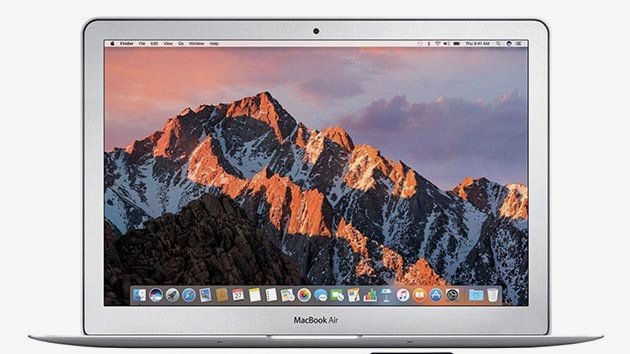 Silver macbook air with mountain background