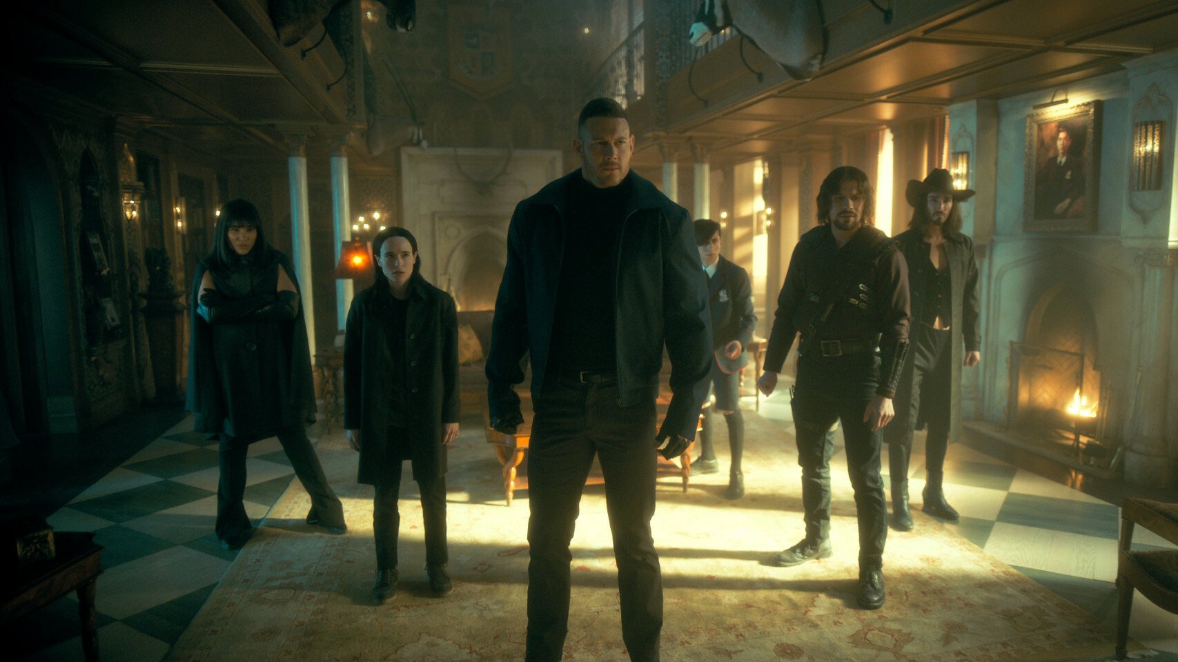 (L to R) Emmy Raver-Lampman as Allison Hargreeves, Elliot Page as Number 7, Tom Hopper as Luther Hargreeves, Aidan Gallagher as Number Five, David Castañeda as Diego Hargreeves, and Robert Sheehan as Klaus Hargreeves in 'The Umbrella Academy' Season 3.