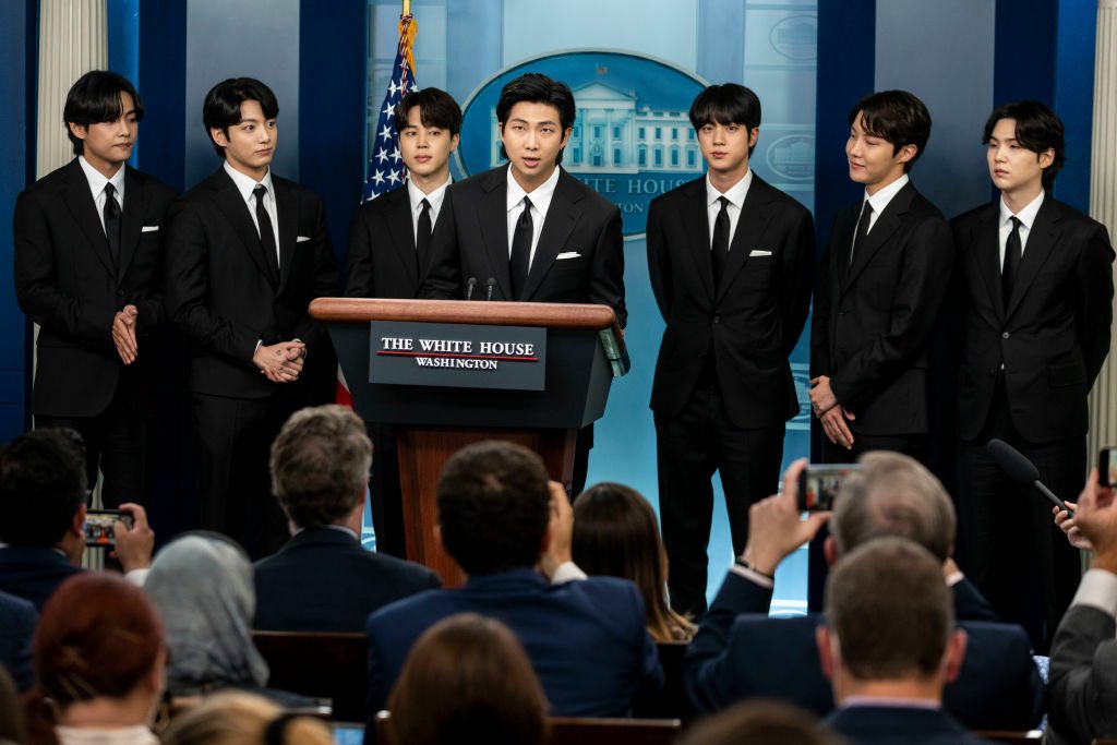 Members of the South Korean pop group BTS or Bantam Boys, (L to R) V (Kim Taehyung), JK (Jeon Jungkook), Jimin (Park Ji-min), RM Rap Monster (Kim Namjoon), Jin (Kim Seok-jin), J-Hope (Jung Ho-seok) and Suga (Min Yoongi) speak at the daily press briefing at the White House, on Tuesday, May 31, 2022 in Washington, DC.