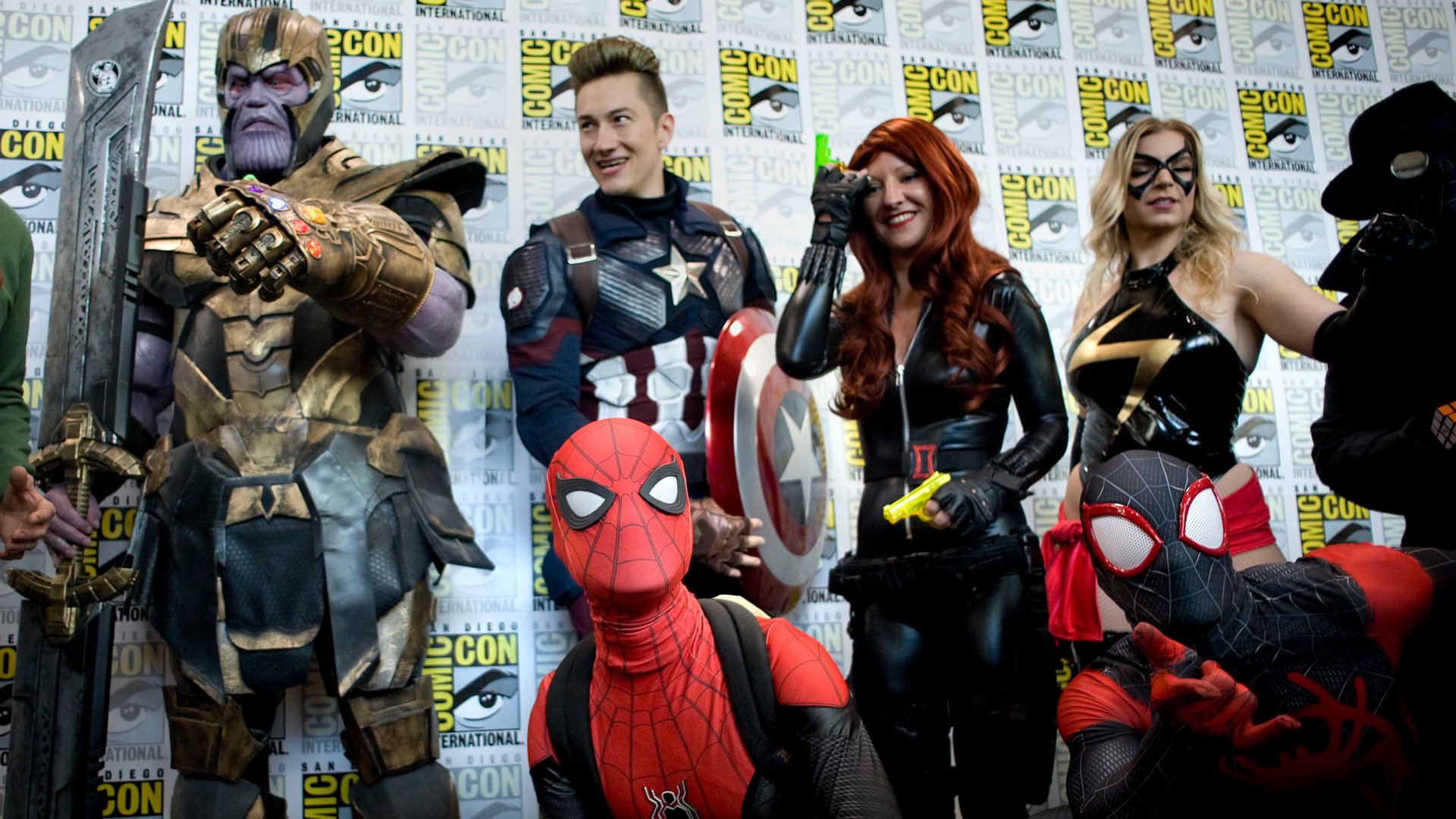 A photo of San Diego Comic-Con attendees dressed in Marvel cosplay.