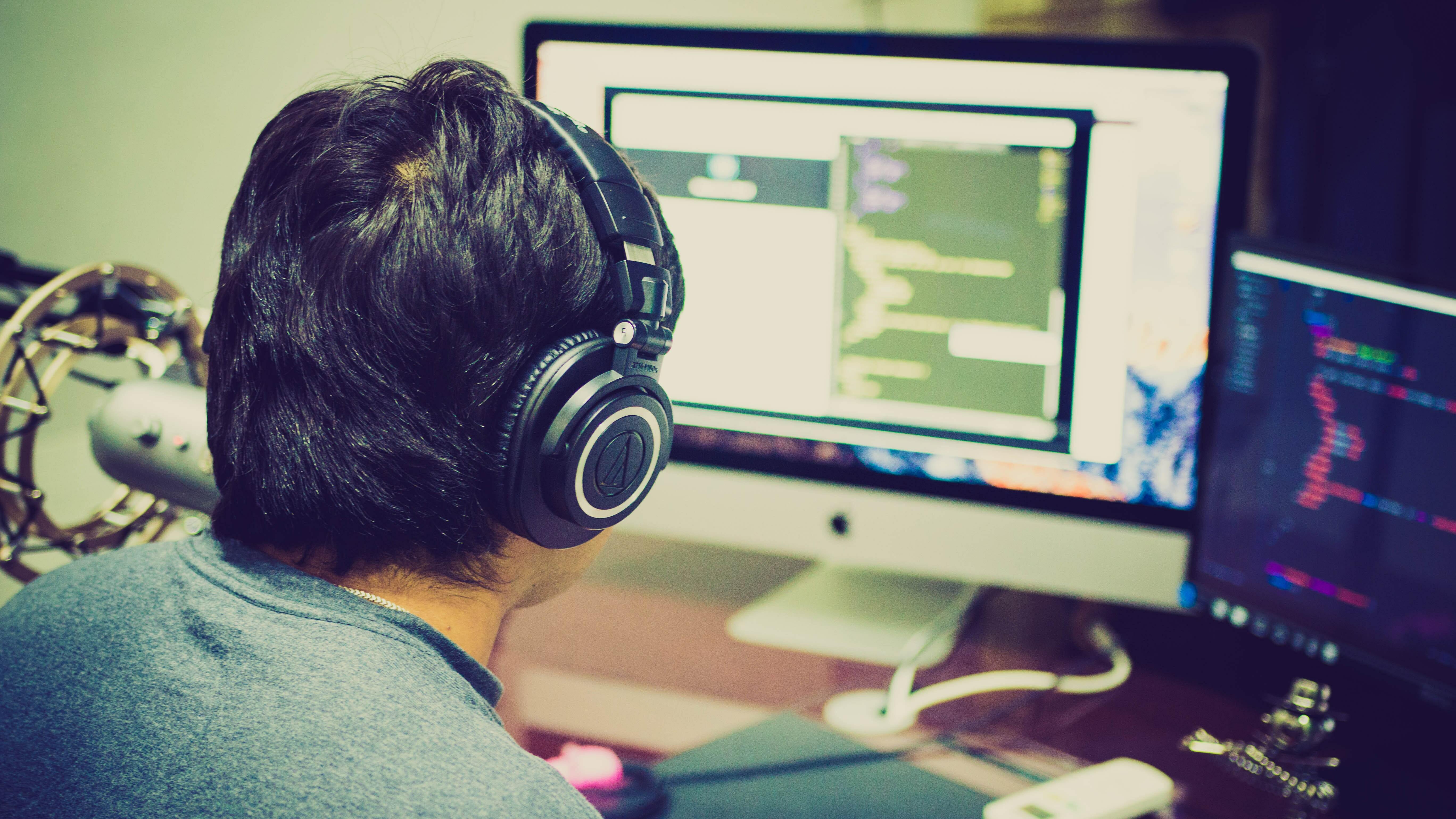 Man with headphones gaming