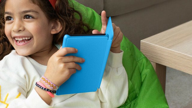 Girl with Kindle Kids device