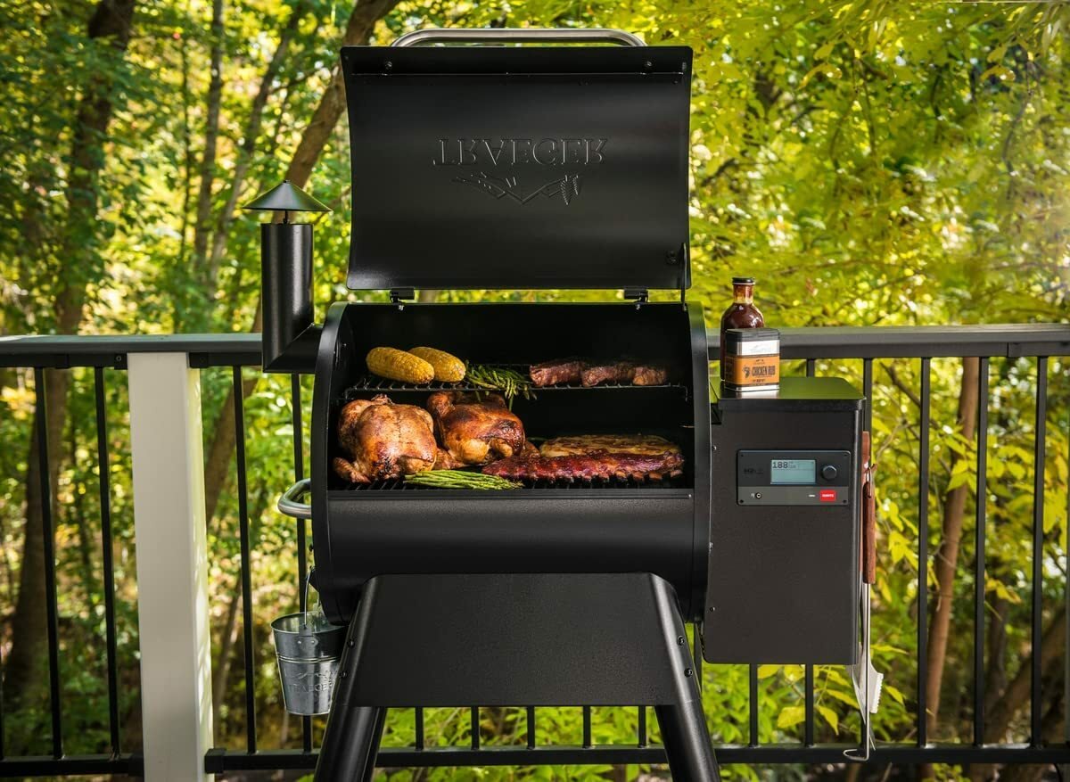 Grill on a patio full of grilling food