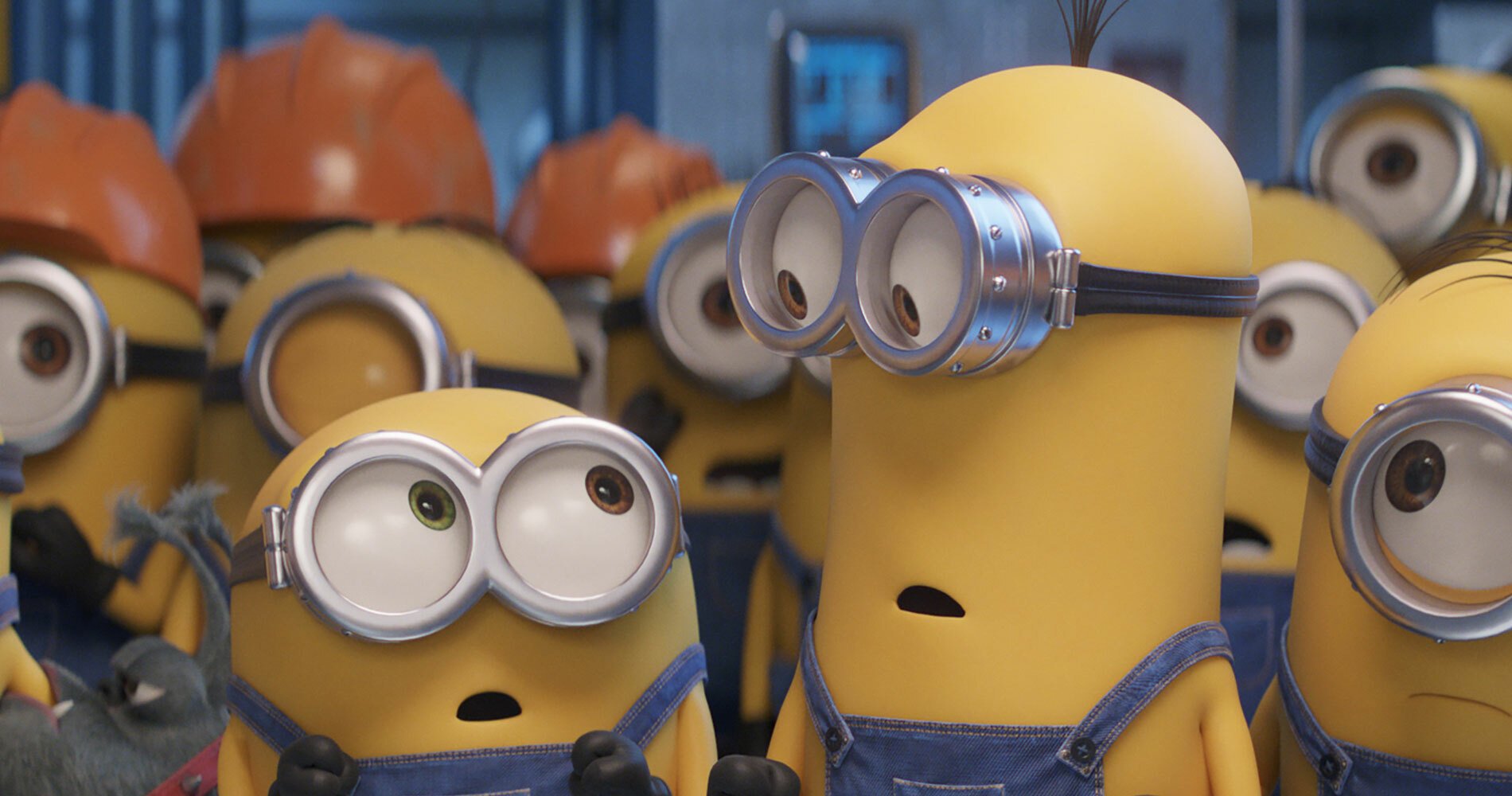 Two Minions looking at each other.