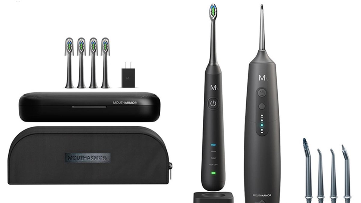 Black electric toothbrush and sonic flosser with replacement heads and carrying case