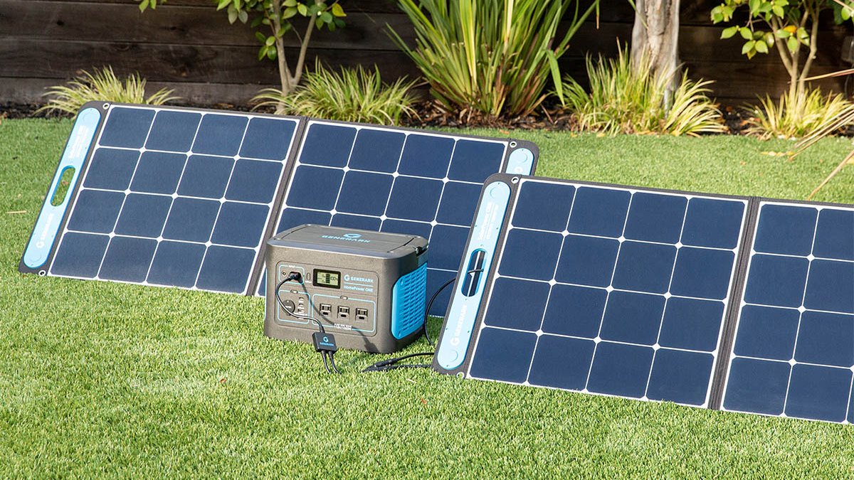 Four solar panels connected to grey and blue power generator