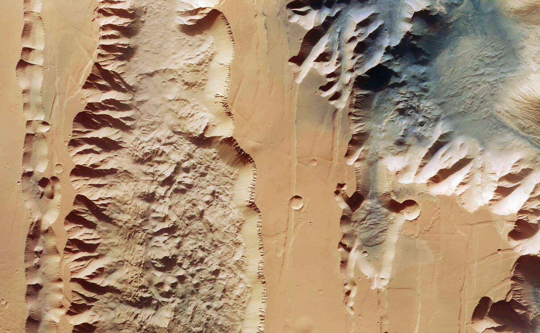 Two great chasms in Mars' Valles Marineris canyon.
