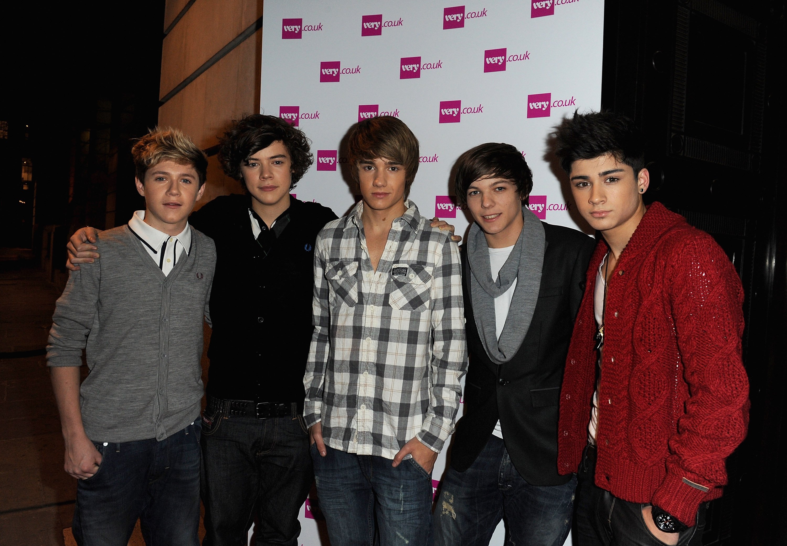 X-Factor finalists One Direction (L-R) Niall Horran, Harry Styles, Liam Payne, Louis Tomlinson and Zain Malik attend the Very.co.uk Christmas Catwalk Show held at Victoria House on November 24 in London, England