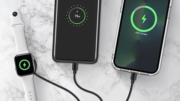 3-in-1 USB-C, iPhone & Apple Watch Lightning Charging Cable on a white table.