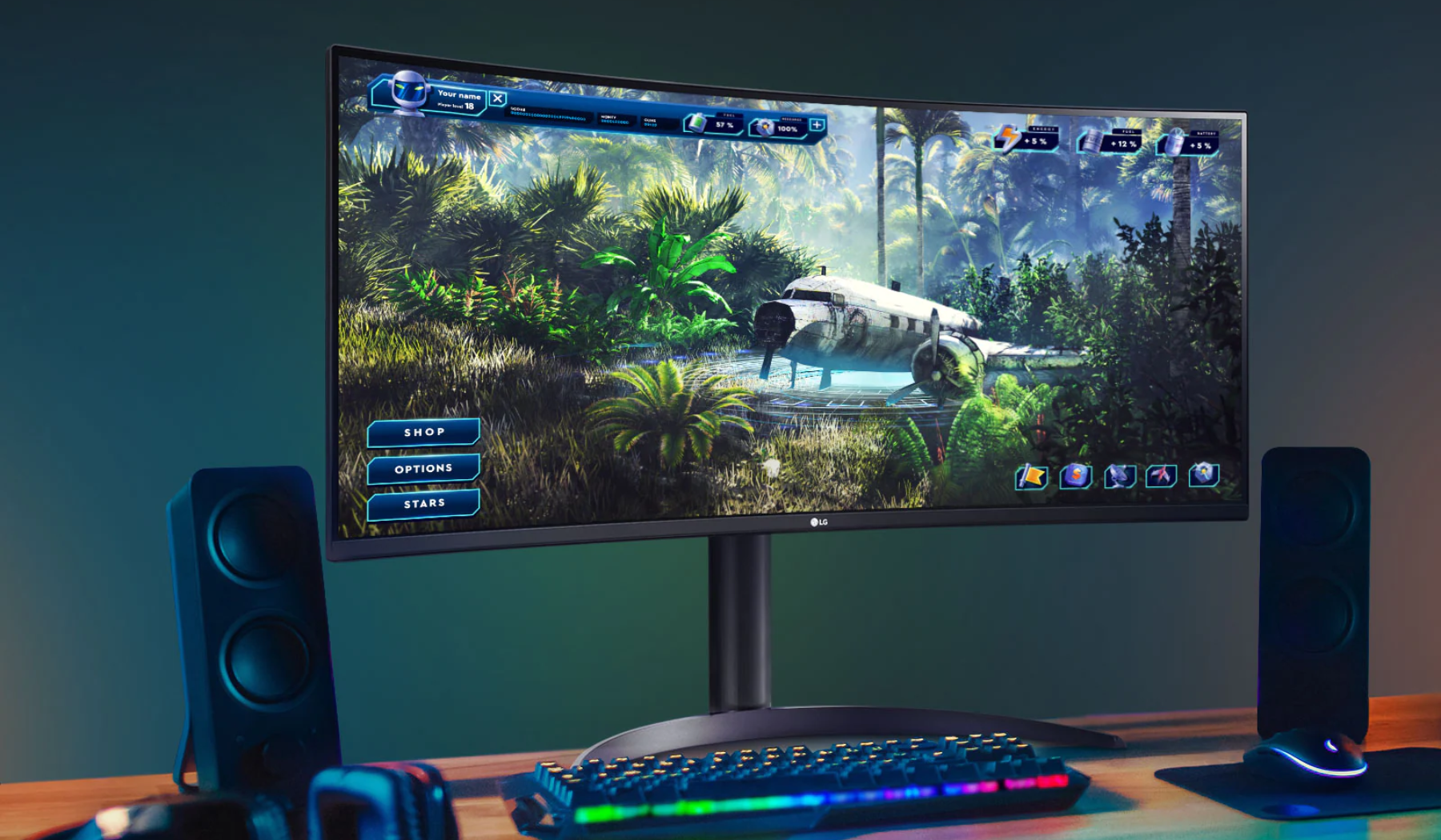 LG curved monitor on desk with speakers and keyboard