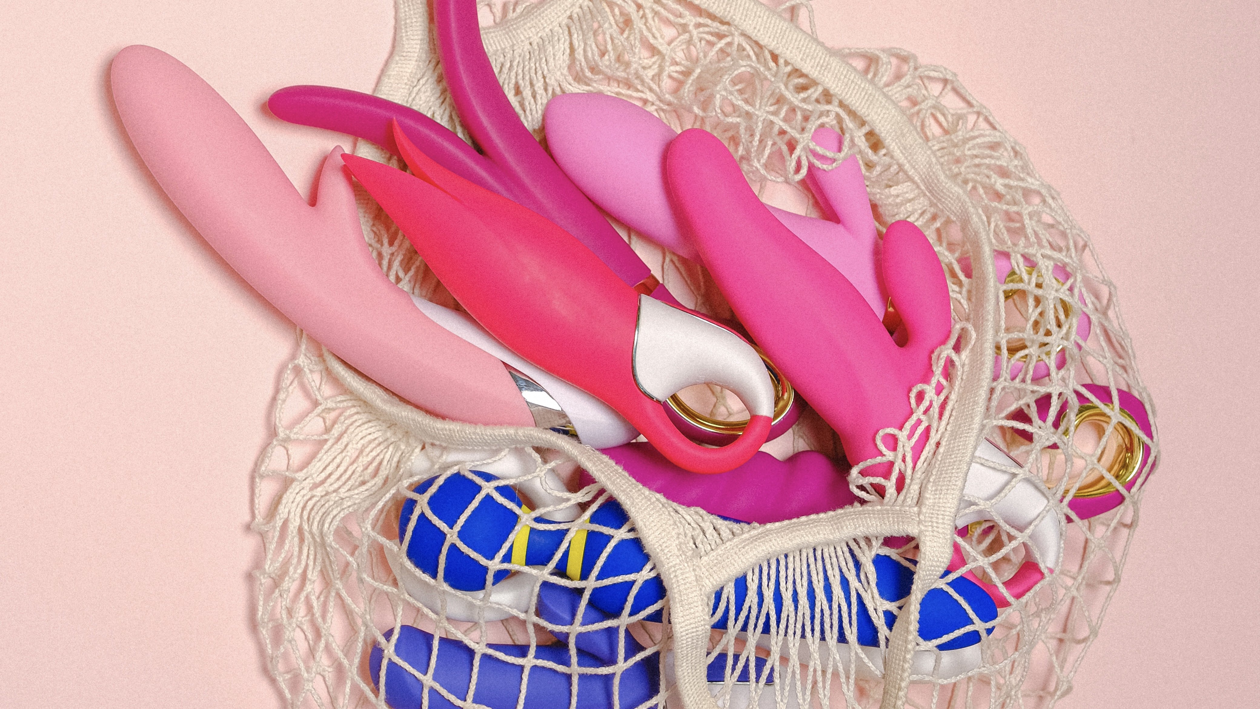bag full of sex toys on a pink background