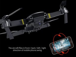 Black and yellow drone with rotating phone under it