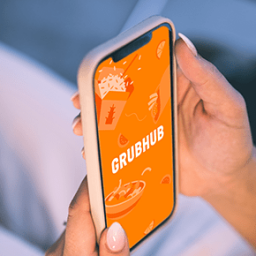 person holding grubhub on their phone