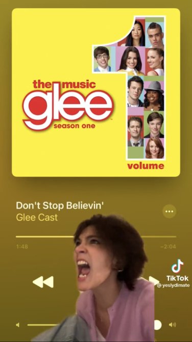 Woman screaming in front of "Don't Stop Believin' (Glee Cast Version)"