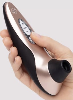 black and gold womanizer clit suction toy