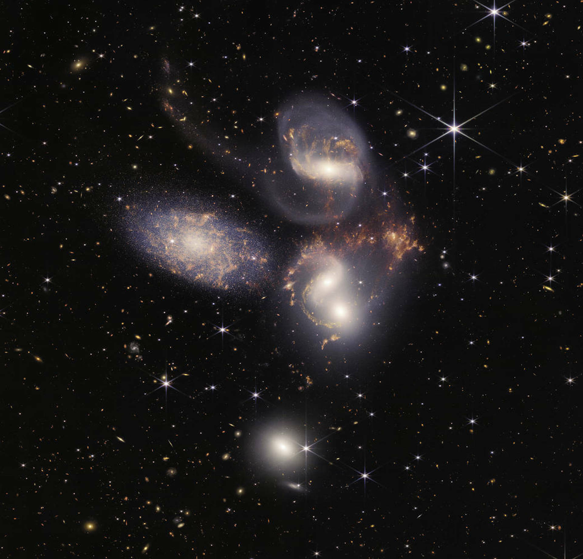 A collection of galaxies photographed close together by the James Webb Telescope.