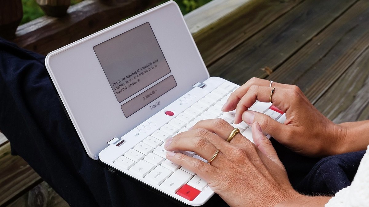 Person using the Freewrite Traveler Portable Writing Tool.